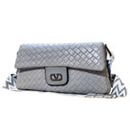 Gray quilted handbag with a strap on a white background