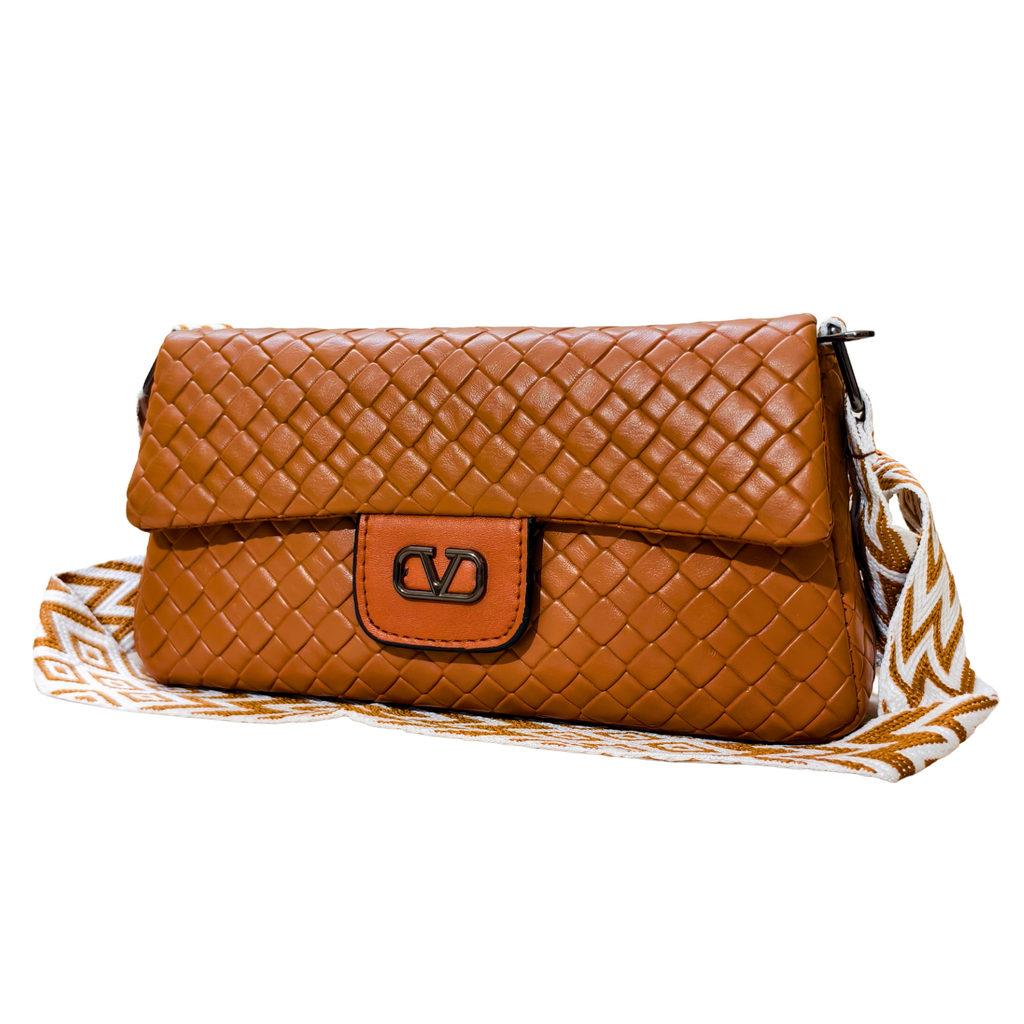 Brown woven handbag with a strap on a white background