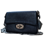 Black denim handbag with a decorative strap on a white background