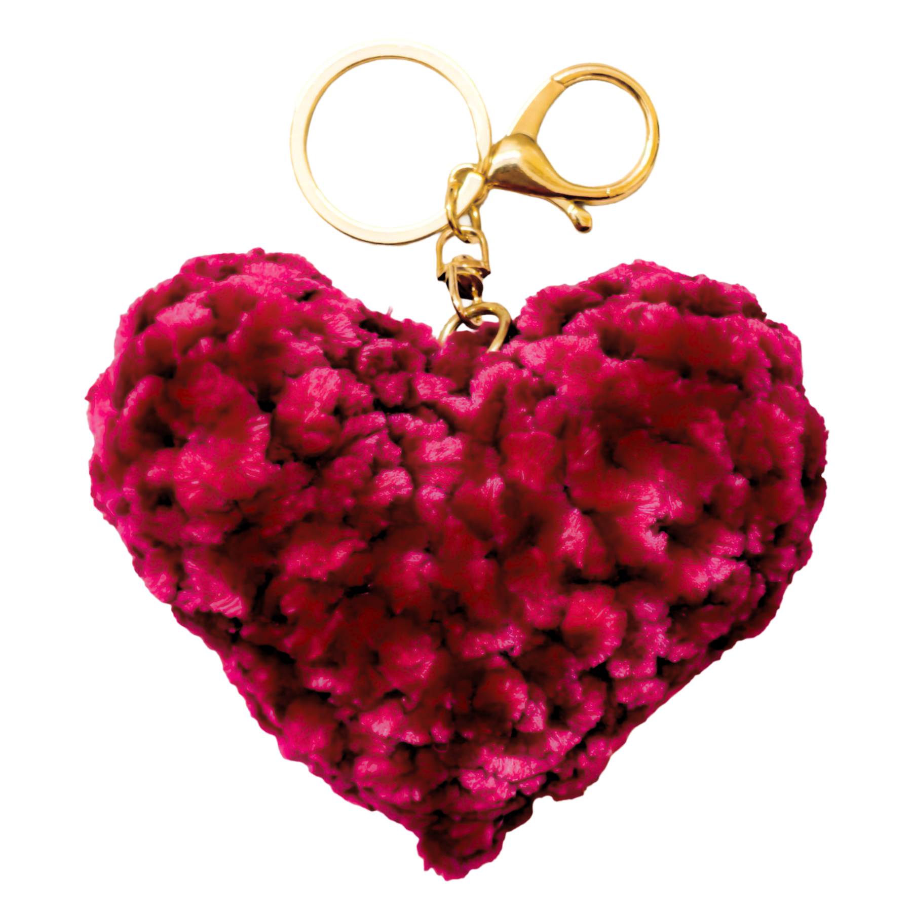 Pink heart-shaped keychain with a gold ring on a white background