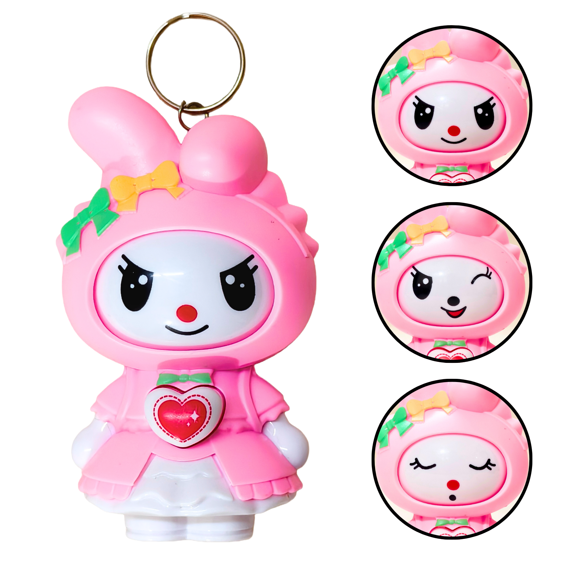 Pink cartoon character keychain with different facial expressions on a white background