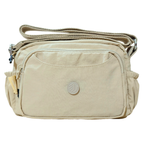 Khaki Beige Sling Bag In Front Of White Background.