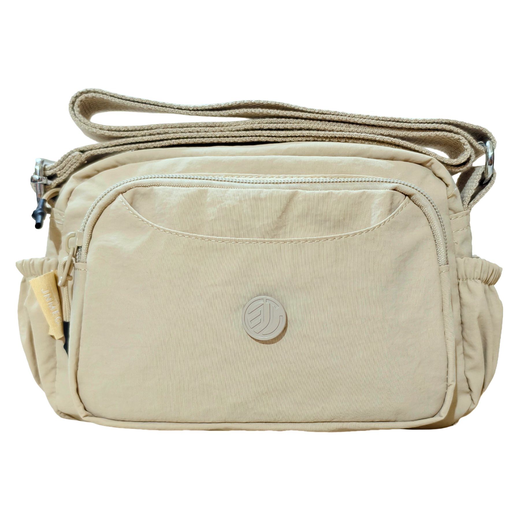 Khaki Beige Sling Bag In Front Of White Background.