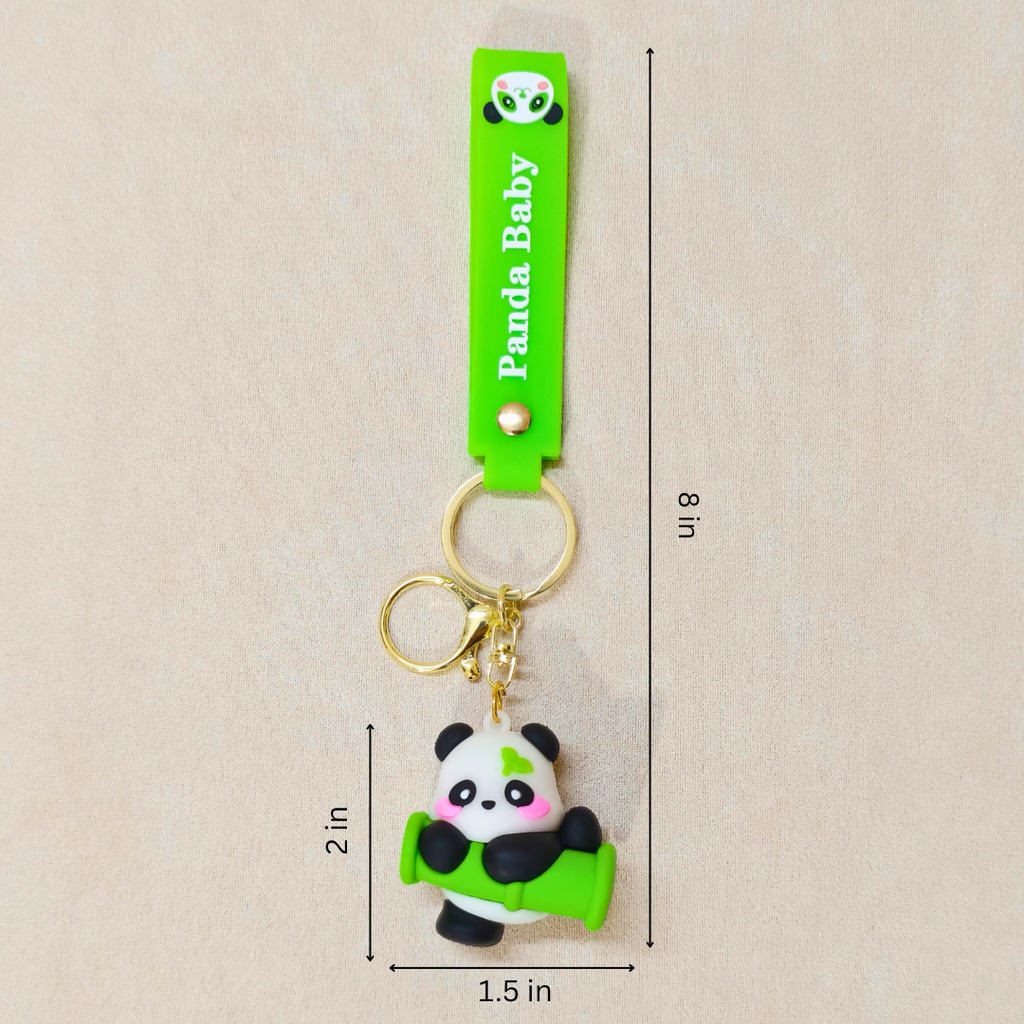 Panda keychain with green strap labeled 'Panda Baby' on a beige background