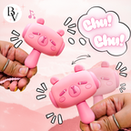 Two pink baby rattles held by hands with a pink background and 'Chu! Chu!' text.
