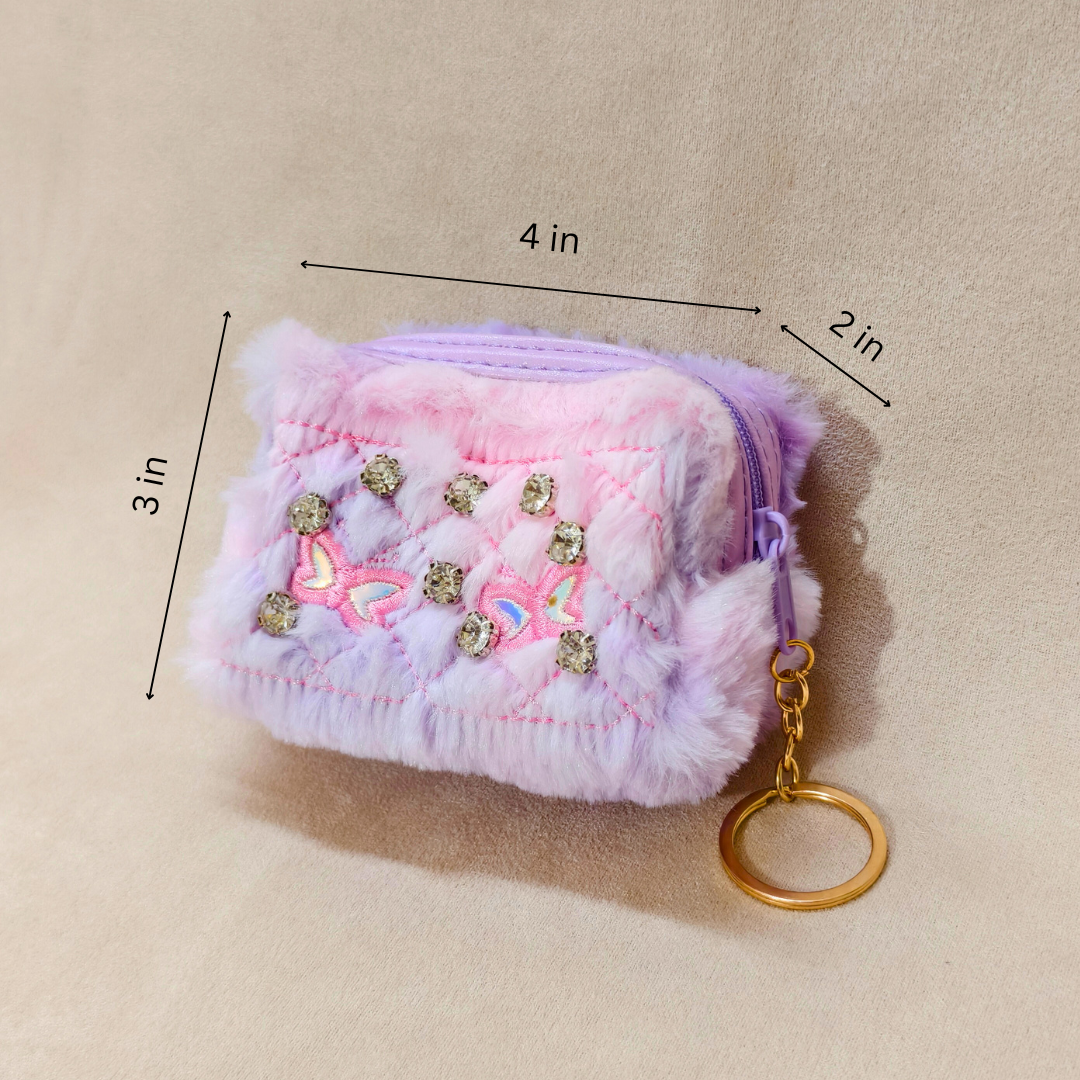 Pink fluffy pouch with gold accents and measurements on a beige background