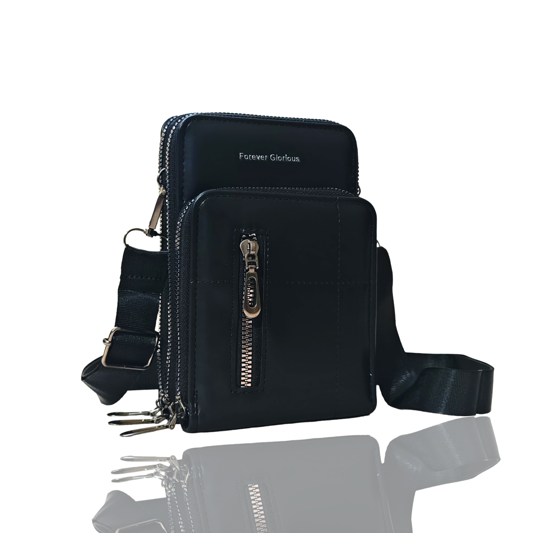 Black crossbody bag with multiple pockets and zippers on a white background