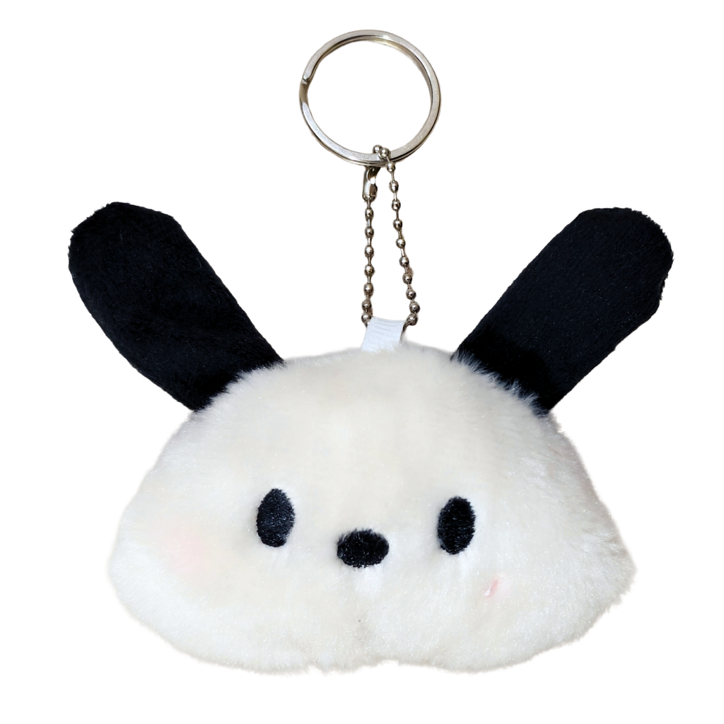 Plush keychain with black ears and white face on a white background