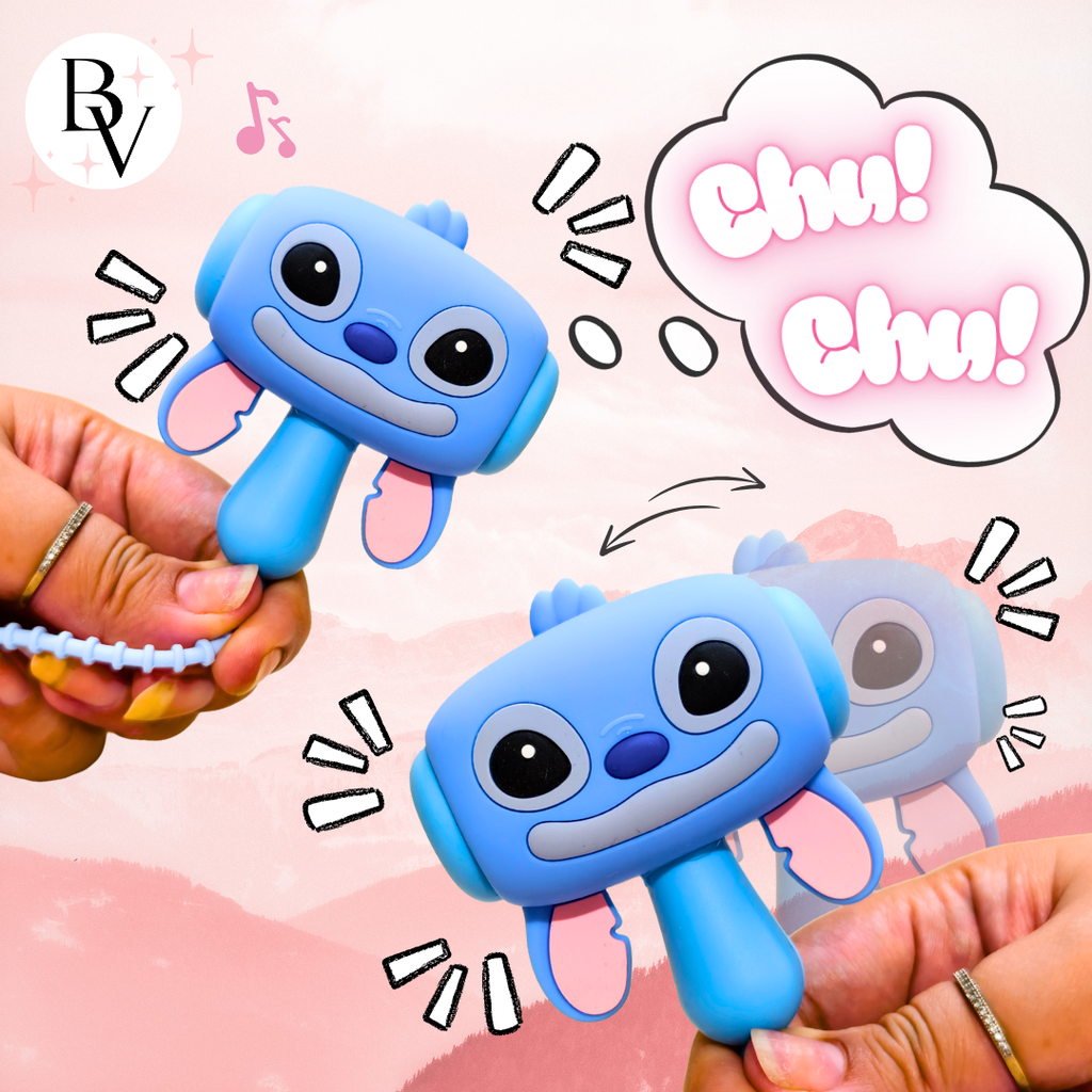 Blue cartoon character toy with 'Chu! Chu!' text on a pink background