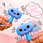 Blue cartoon character toy with 'Chu! Chu!' text on a pink background