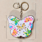 A butterfly-shaped keychain with a white background and colorful butterfly prints, shown with dimension markings of 3 in by 5 in and 3.5 in.