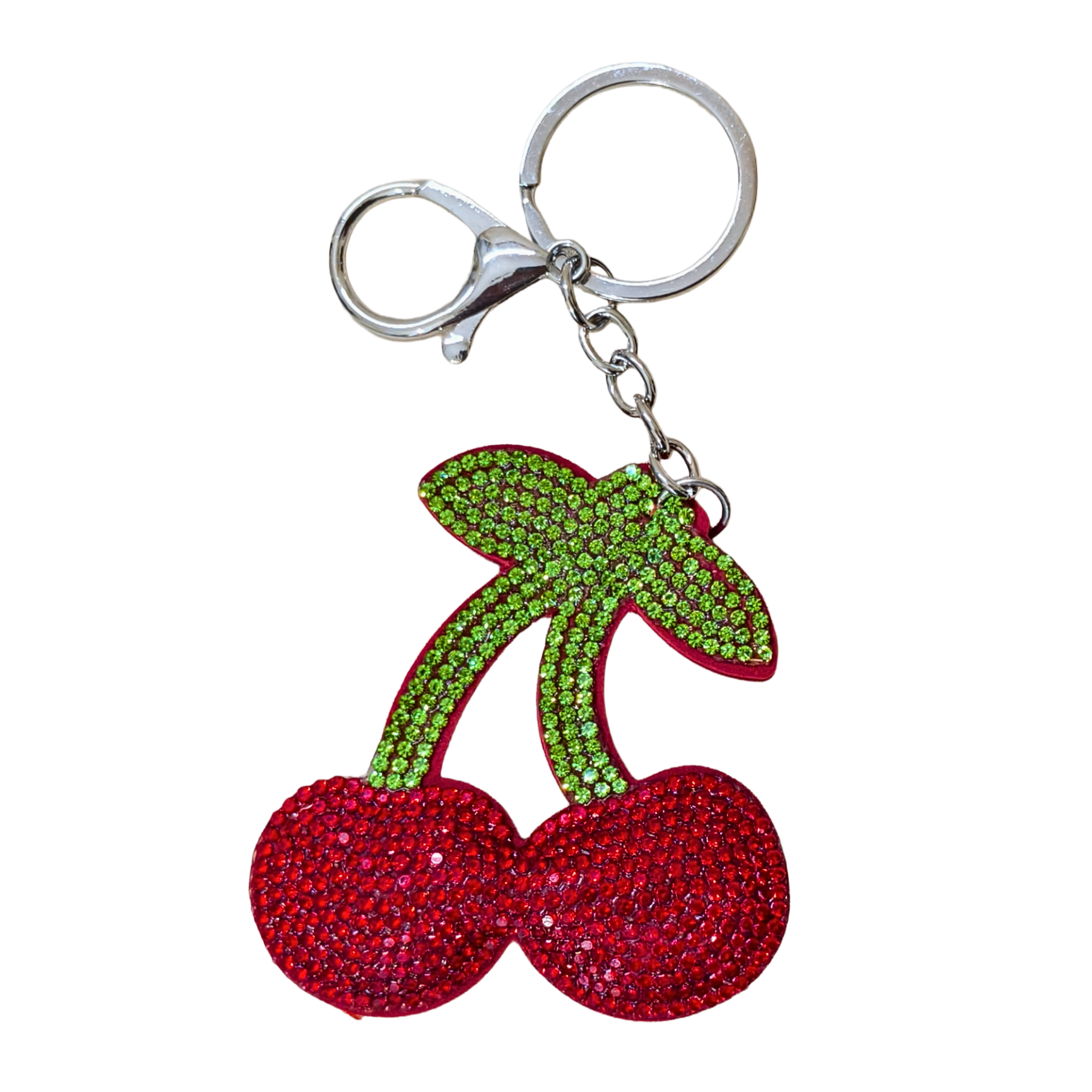 Cherry keychain with a metal latch in front of a white background