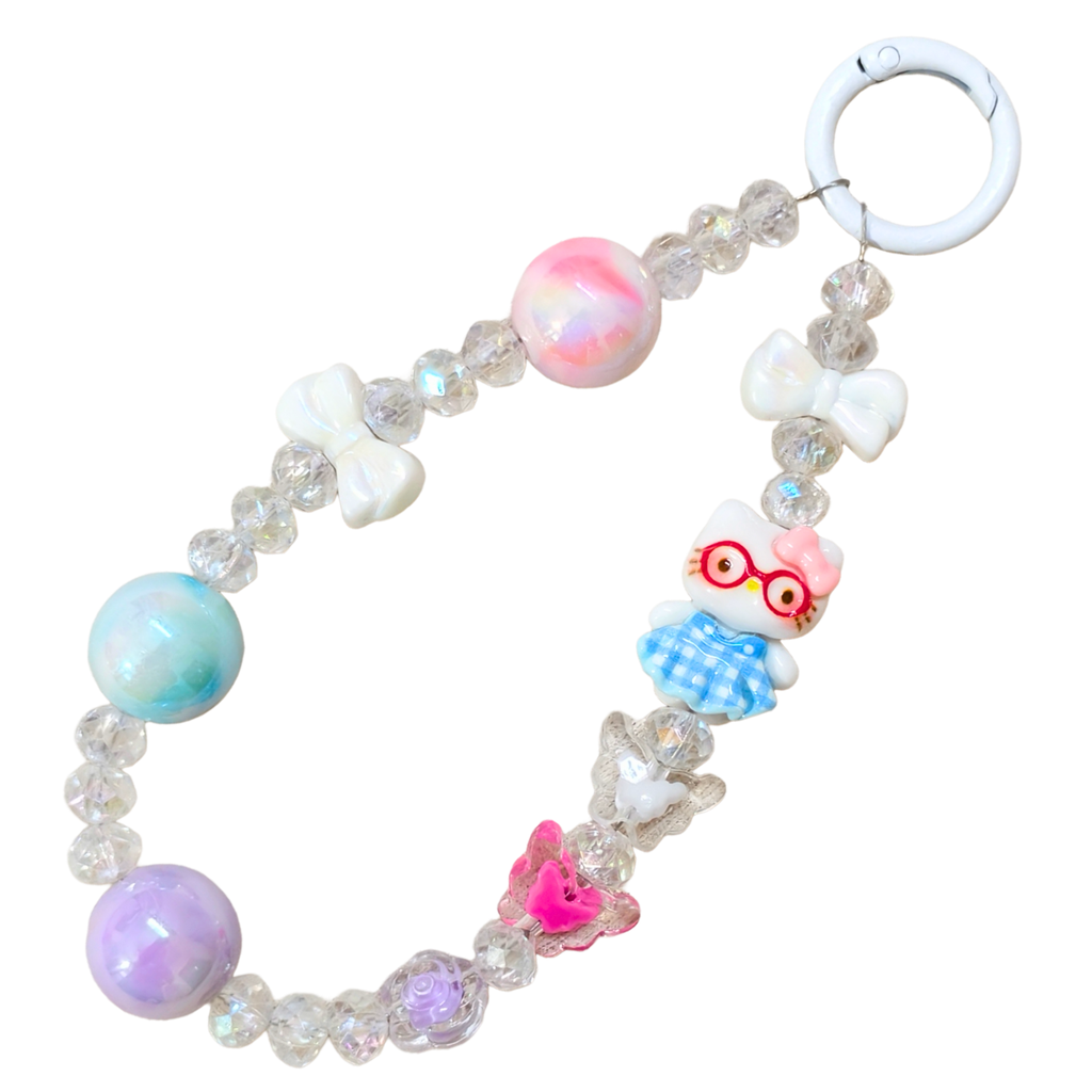 Colorful beaded keychain with cartoon owl charm on a white background