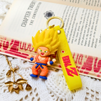 Super Saiyan Key Ring Along With Props On Crochet Background.