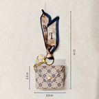Small pouch with a ribbon and measurements on a beige background