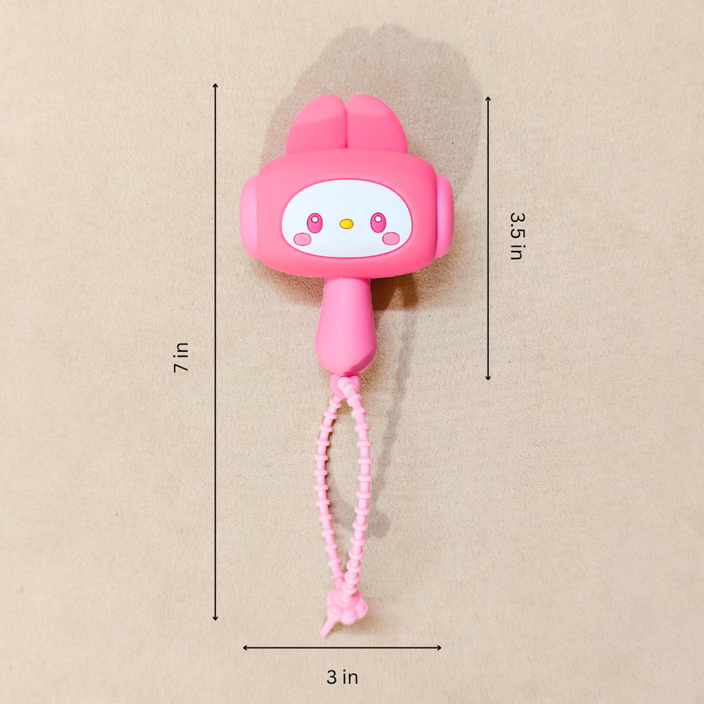 Pink cartoon character with a measurement label on a beige background