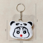 A plush panda-face keychain with a metal key ring and chain, shown on a light beige background with dimension lines indicating 2 in height, 2.5 in width, and 4 in total height.