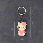 Keychain with Hello Kitty design and measurements on a gray background