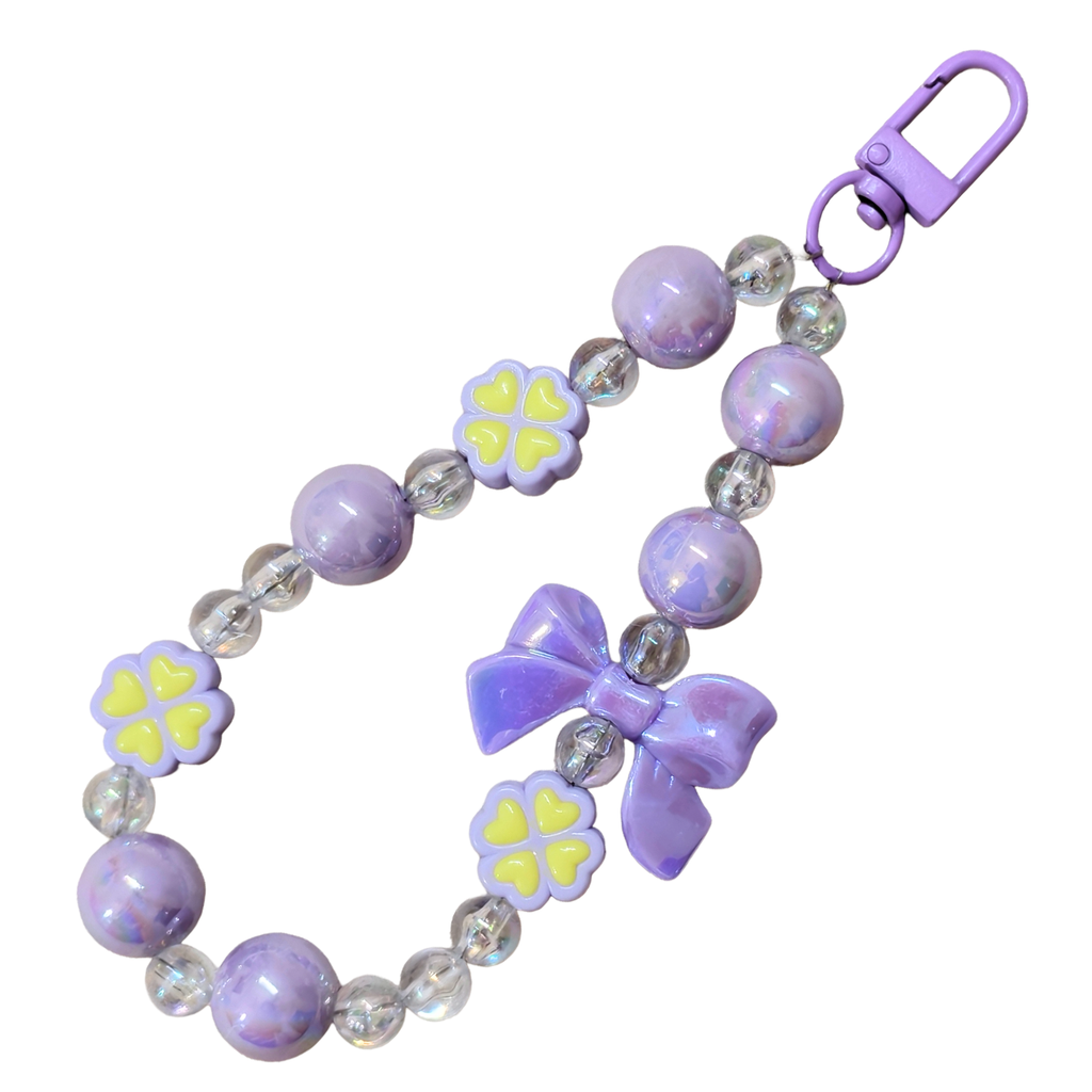 Lilac Bow Charm In The White Background.