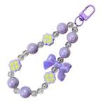 Lilac Bow Charm In The White Background.