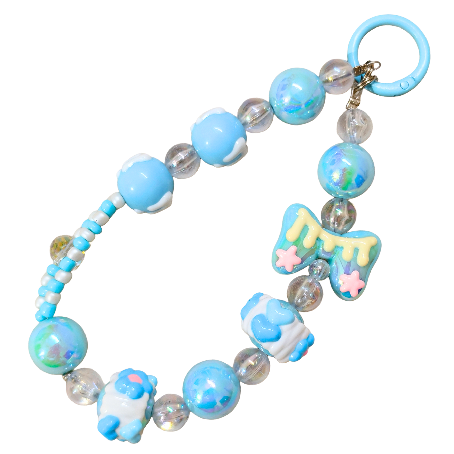 Children's bracelet with blue and clear beads and cartoon character charms on a white background