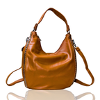 Brown leather handbag with studded details on a white background