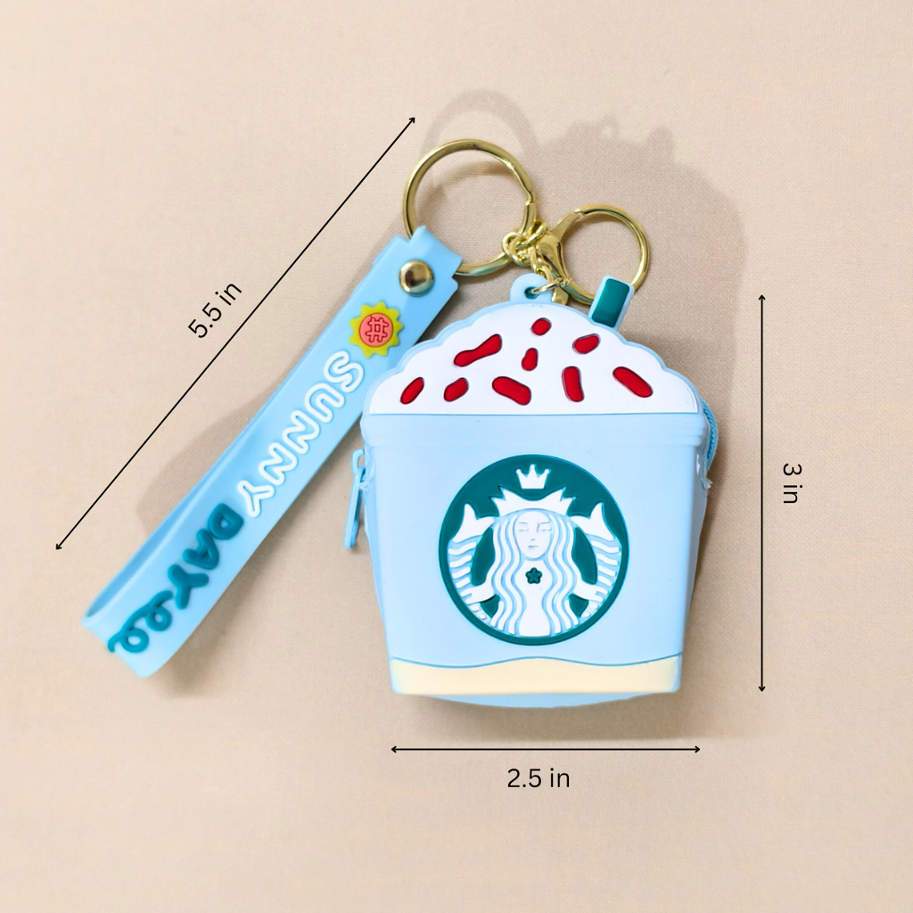 Starbucks cup-shaped keychain with measurements on a beige background