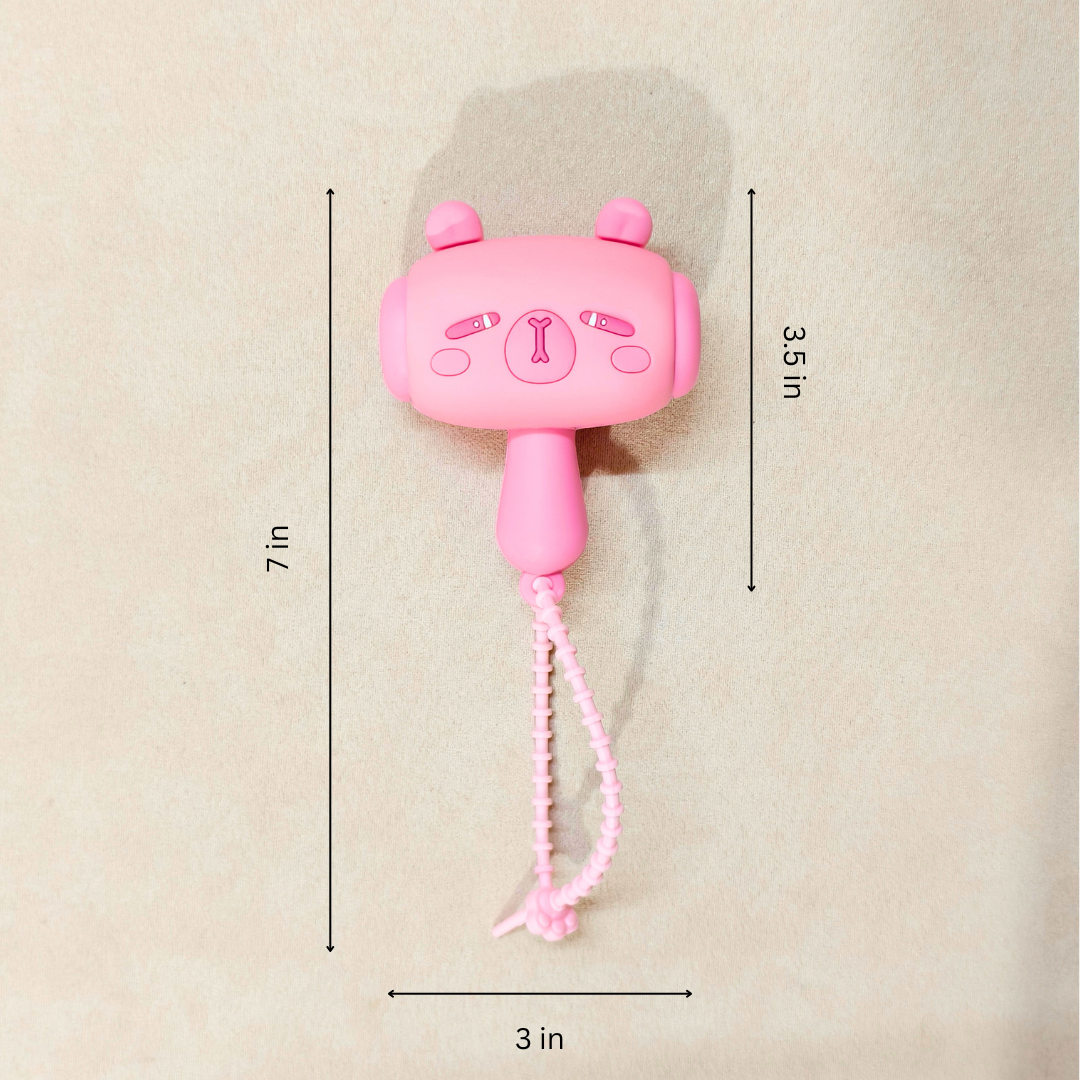 Pink cartoon-style phone with measurements on a beige background