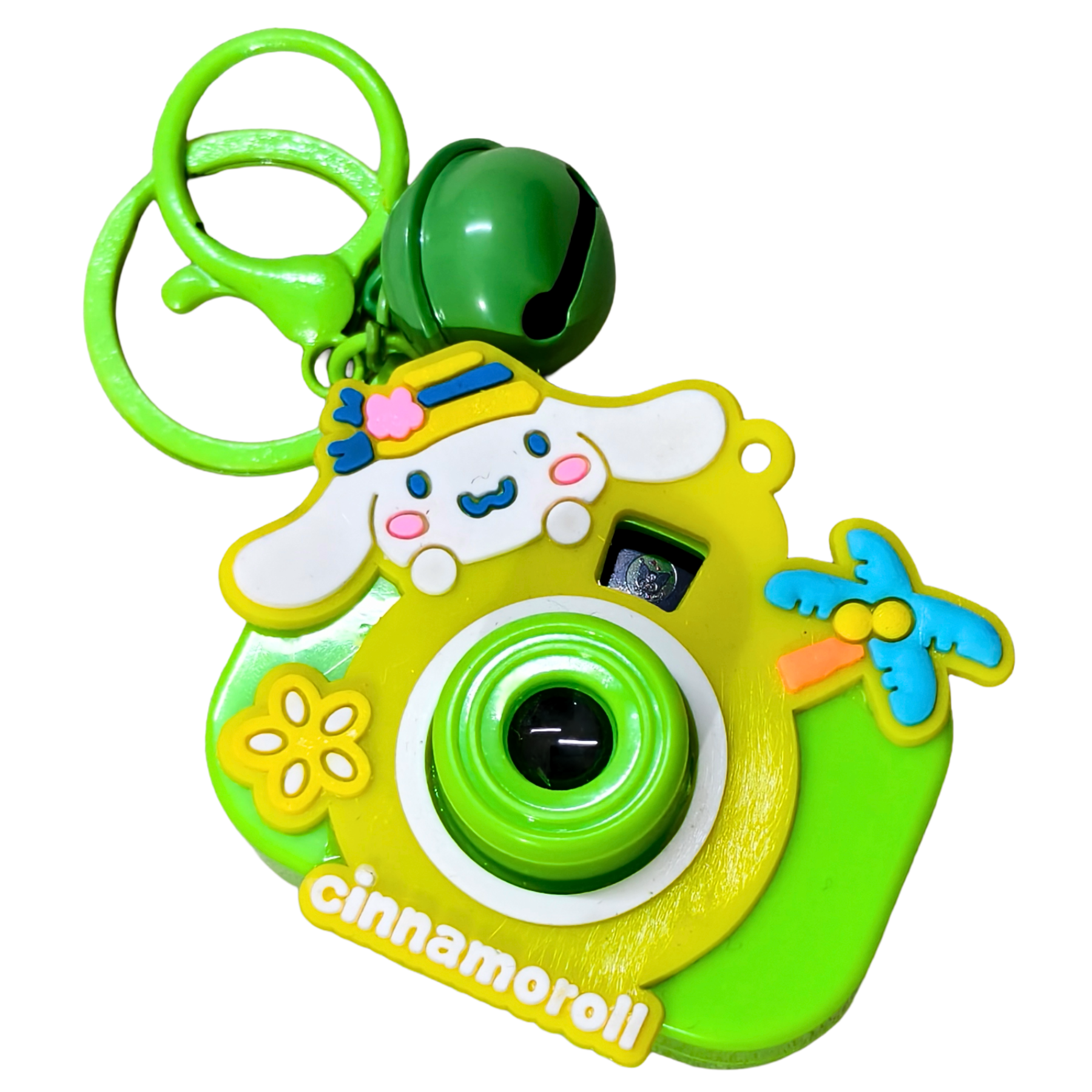 Toy camera with green and yellow colors and a bell on top, featuring the Cinnamoroll character.
