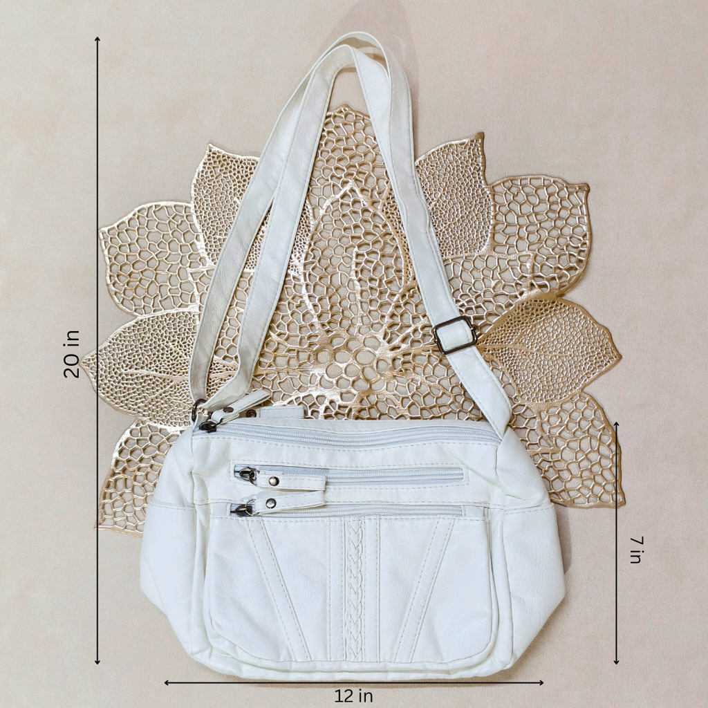 White handbag with measurements on a beige background