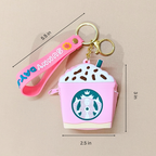 Pink Starbucks air pod case with keychain and measurements on a beige background