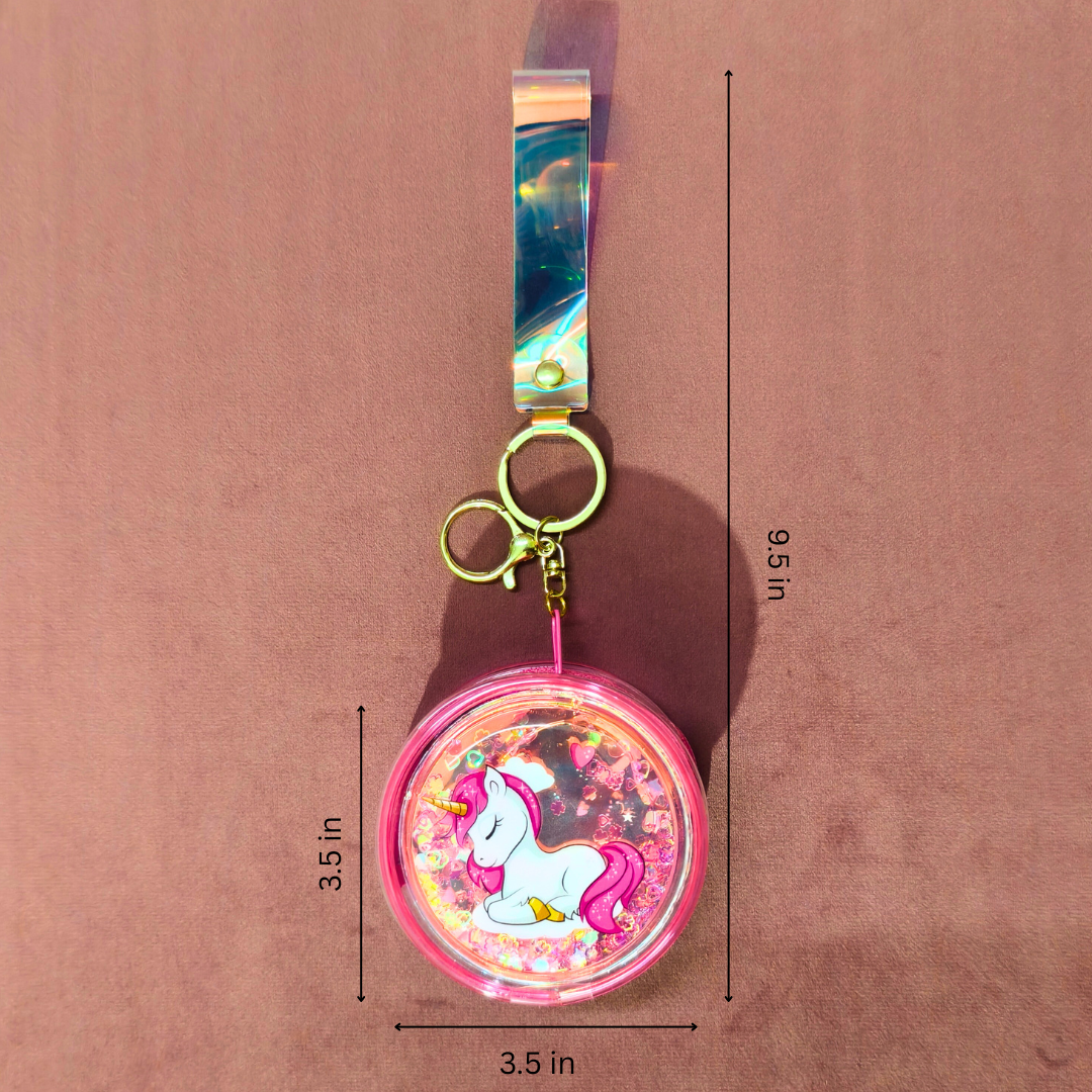 Keychain with unicorn design and measurements on a pink background