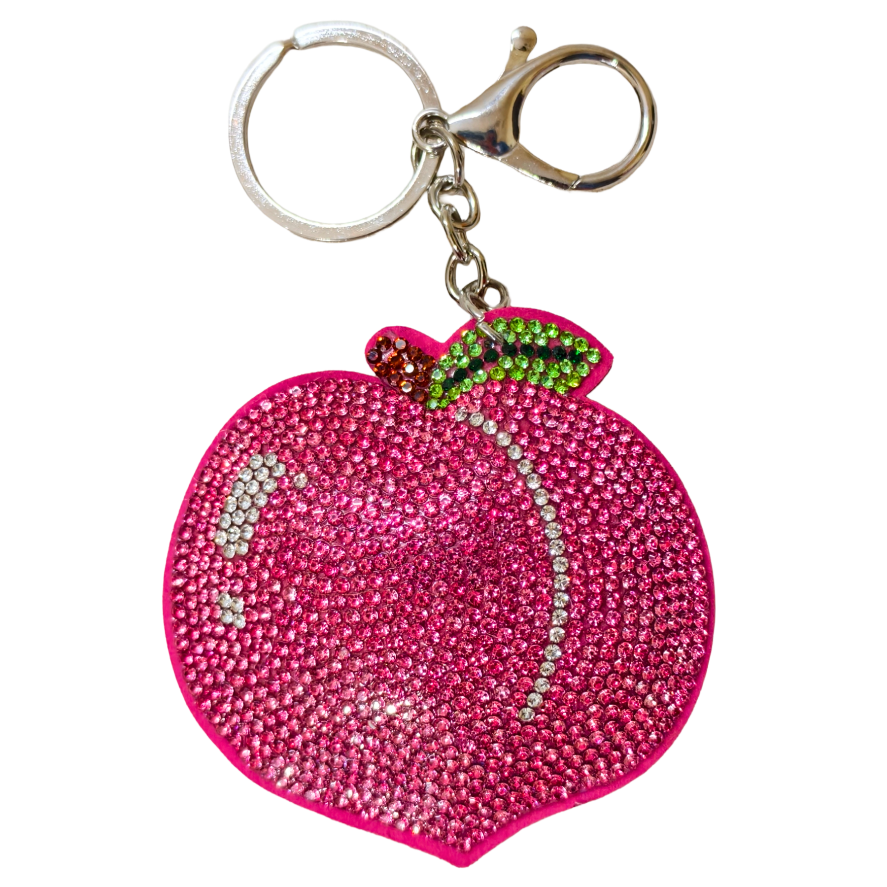 Pink peach-shaped keychain with rhinestones on a white background