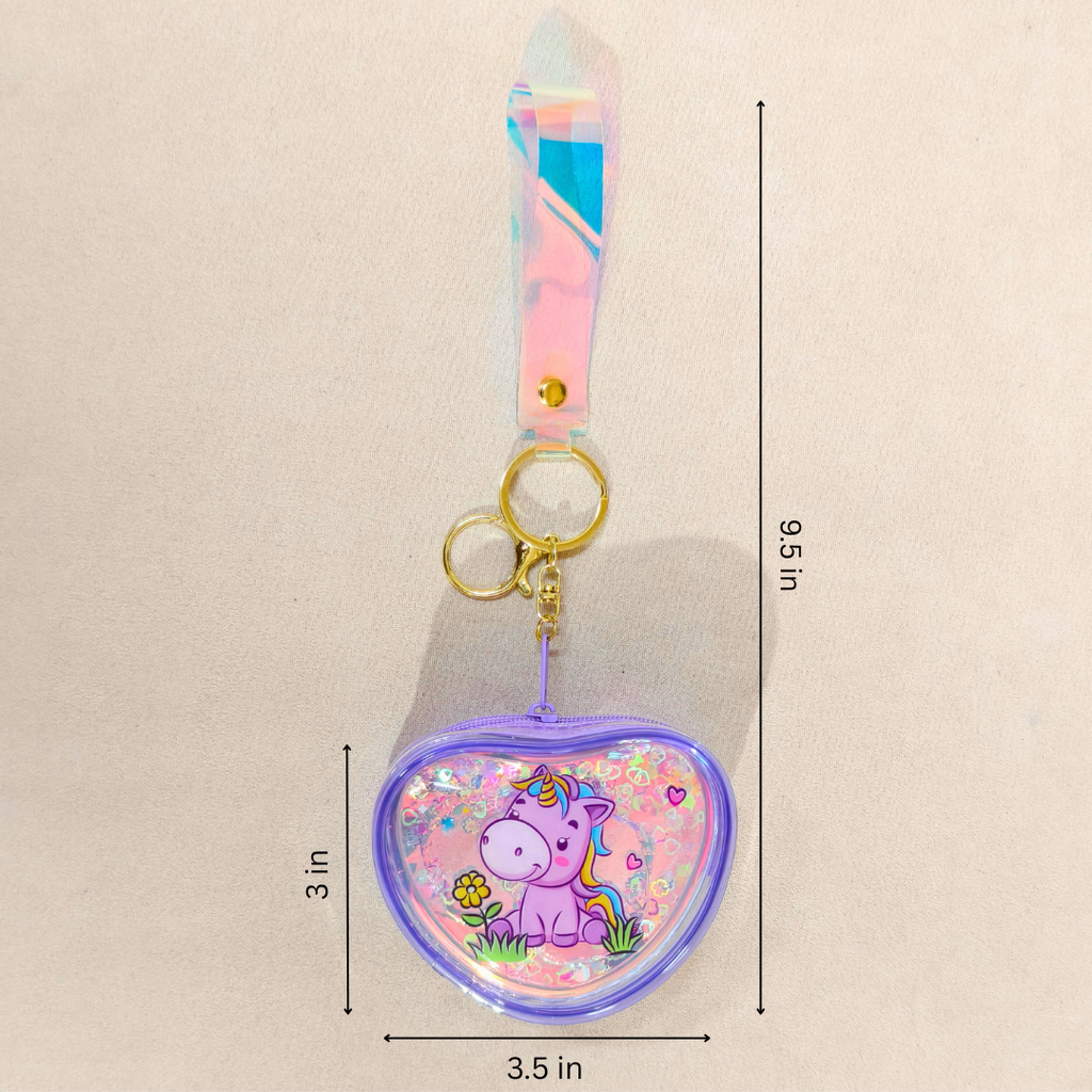 Heart-shaped keychain with unicorn design and measurements on a beige background