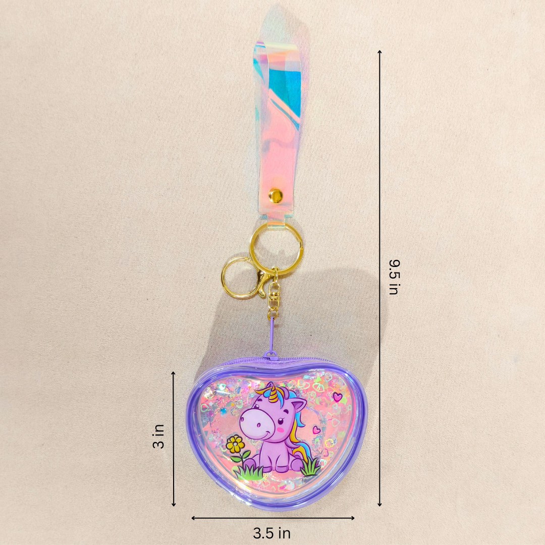 Heart-shaped keychain with unicorn design and measurements on a beige background