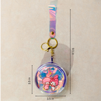 Keychain with cartoon characters and measurements on a beige background