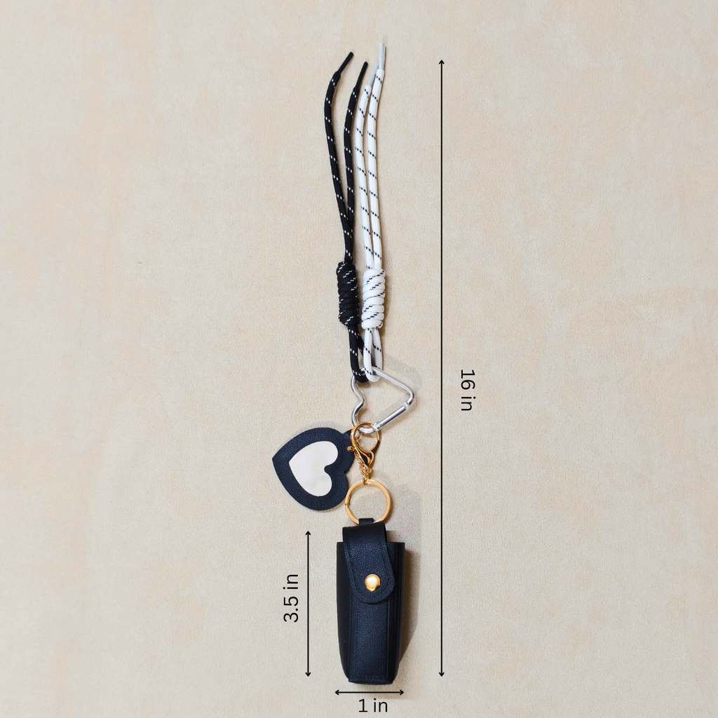 Keychain with measurements on a beige background