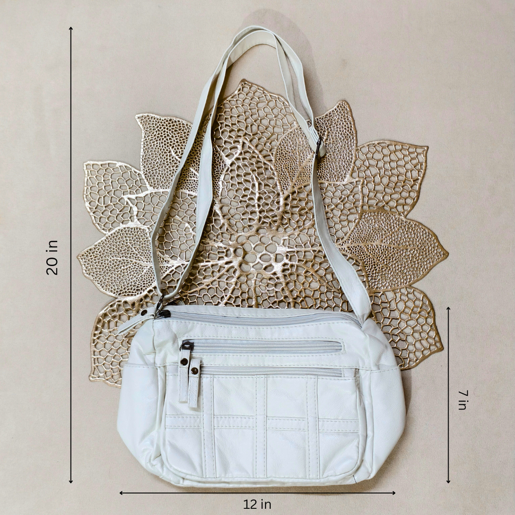 White handbag with measurements on a beige background