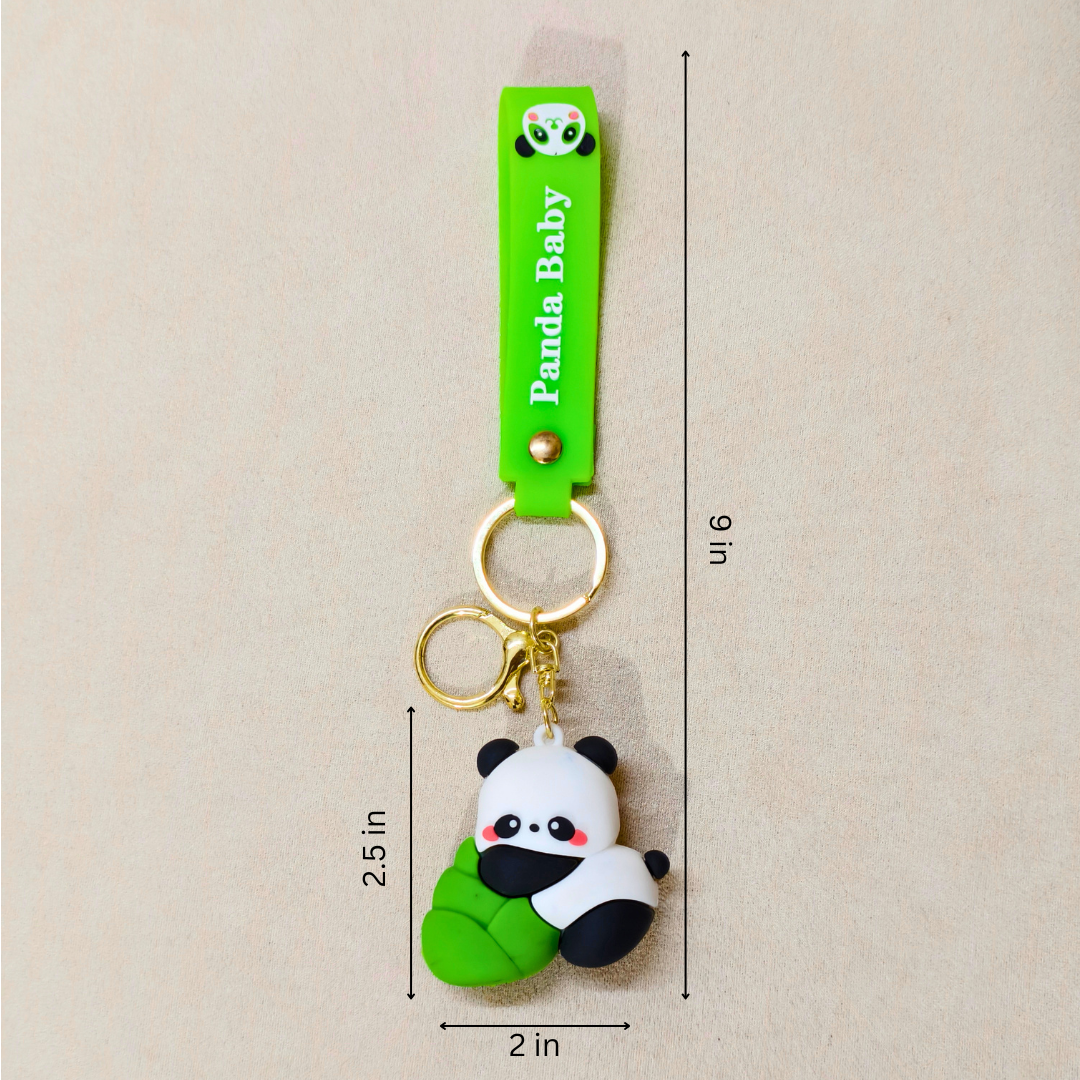 Panda keychain with a green strap labeled 'Panda Baby' on a beige background