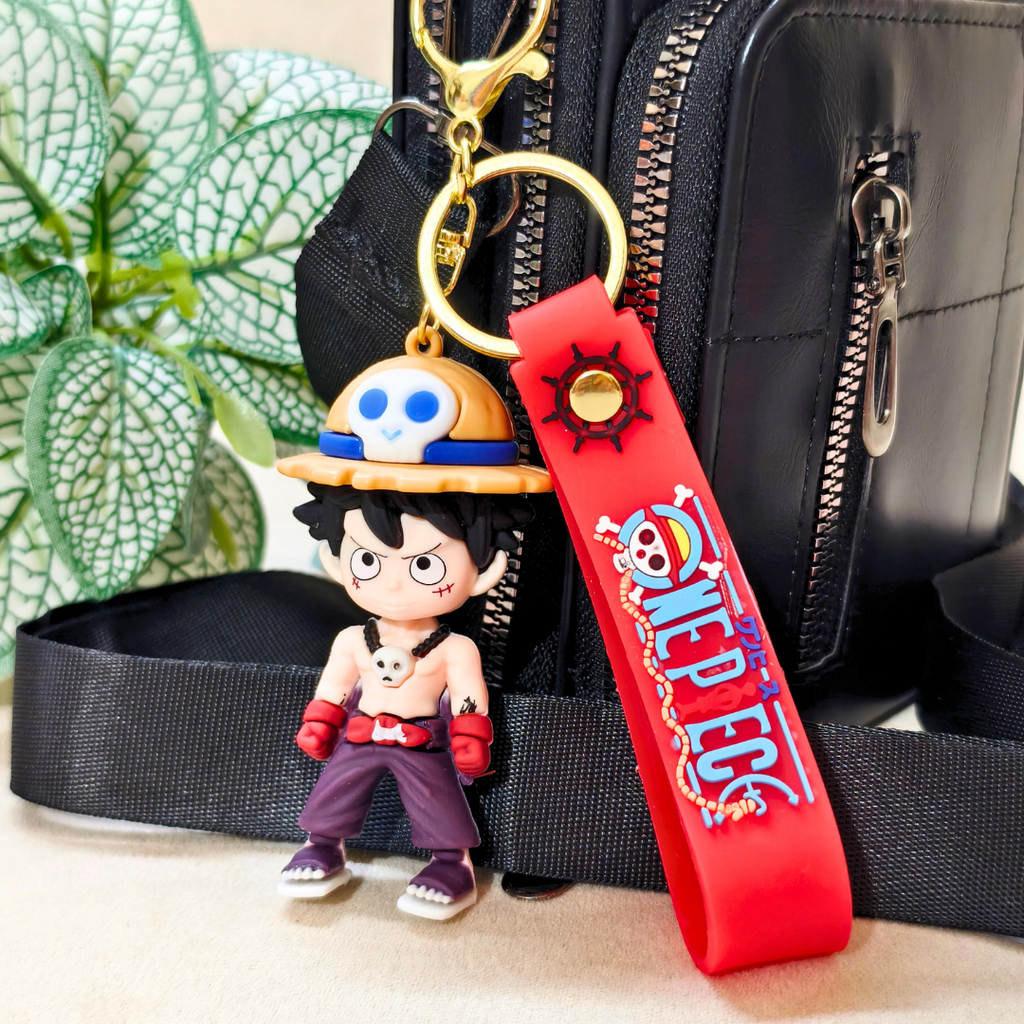 Buff Luffy Keyring Attached With Purse As Bag Charm On Beige Background.