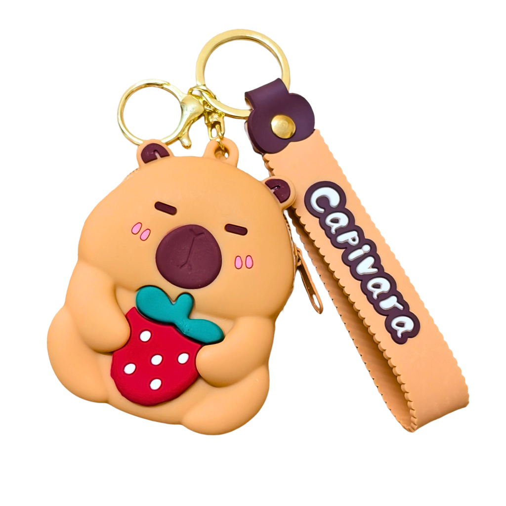 Cute bear-shaped keychain with a strawberry and a strap labeled 'Capivara' on a white background