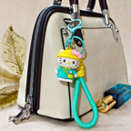 Keychain with cartoon character attached to a handbag