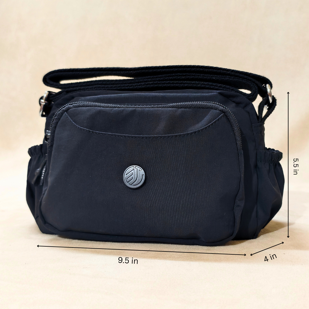 Black Korean Sling Bag With Measurements In Front Of Beige Background.