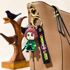 Keychain with 'Demon Slayer' character attached to a brown bag