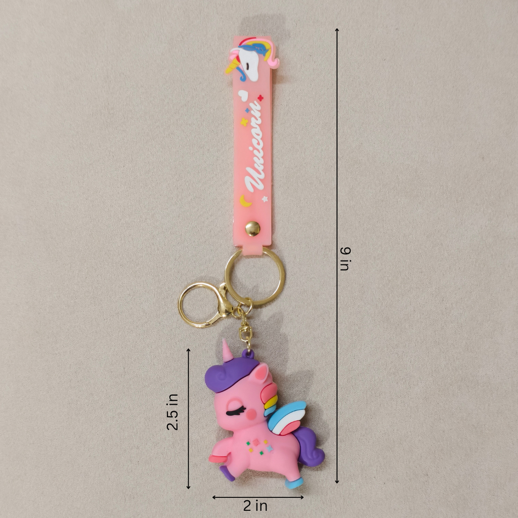 Unicorn keychain with pink strap and measurements on a gray background