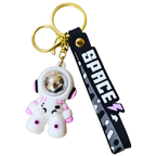 Small Astronaut Keyring On White Background.