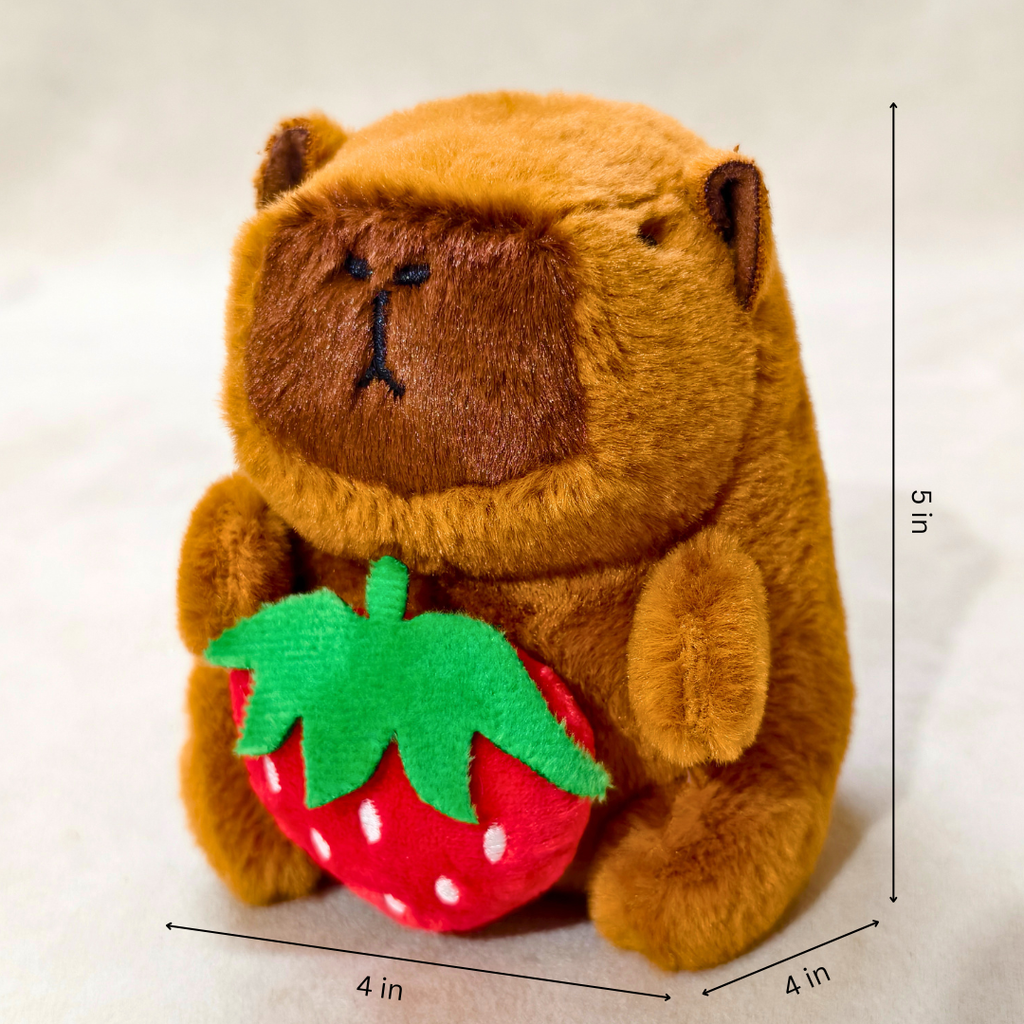Plush toy bear holding a strawberry with measurements on a white background