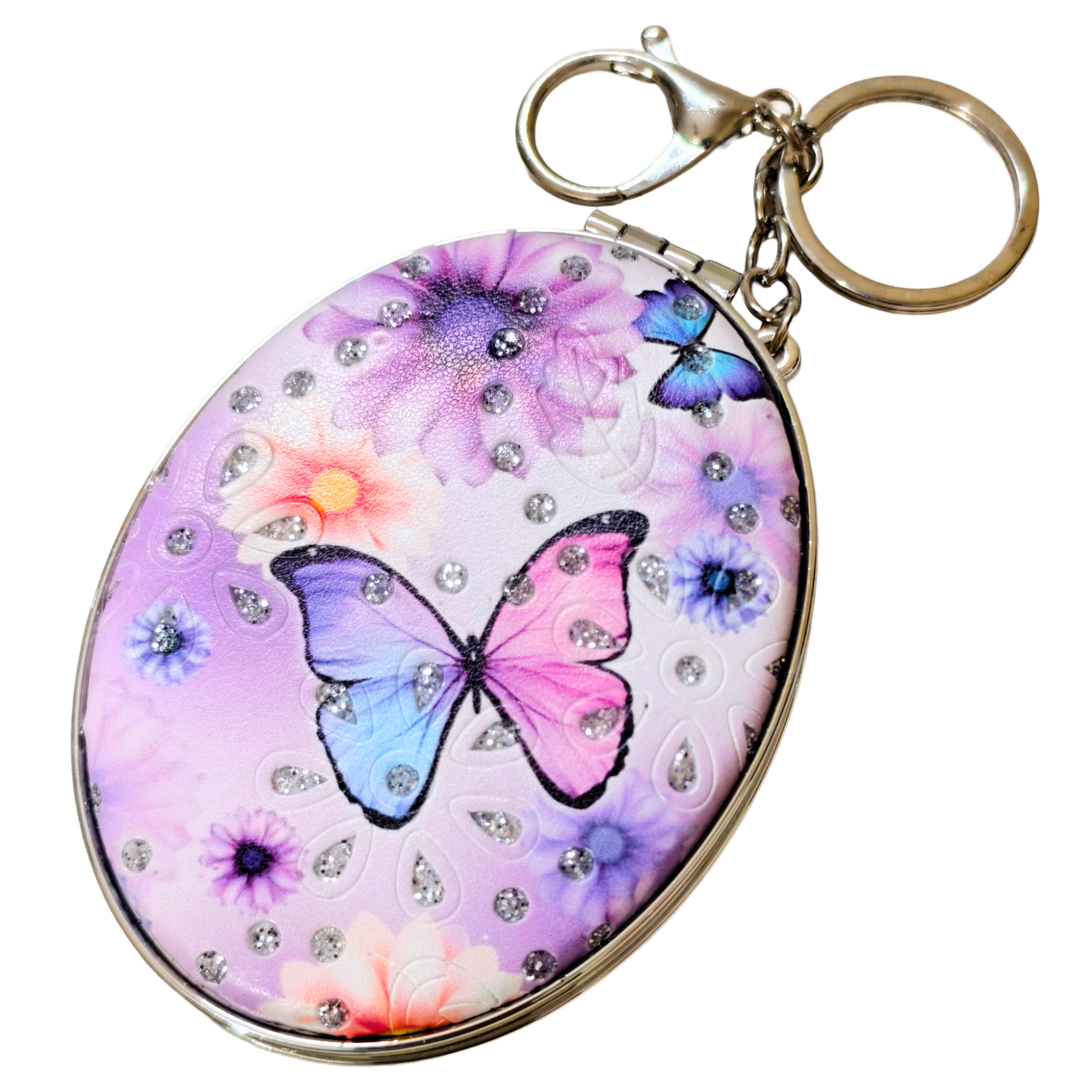 
Oval Butterfly Pocket Mirror On White Background.