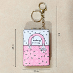 A small rectangular keychain bag or clutch with a gold-tone clasp and chain, shown on a beige background with dimension lines indicating 3.5 in height, 6 in overall height, 2.