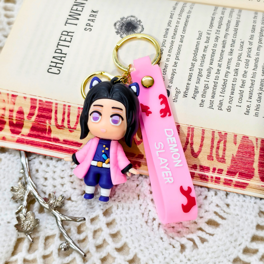 Shinobu Keyring  With Props On  Crochet Background.